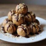 Delicious and nutritious power peanut butter balls displayed on a plate, perfect for energy snacking.